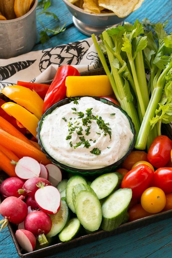 Homemade Ranch Dip Recipe | Homemade Ranch Powder | Homemade Ranch Dressing | Best Ranch Dip #ranch #dip #appetizer #snack #fuyos A bowl of homemade ranch dip surrounded by fresh vegetables.
