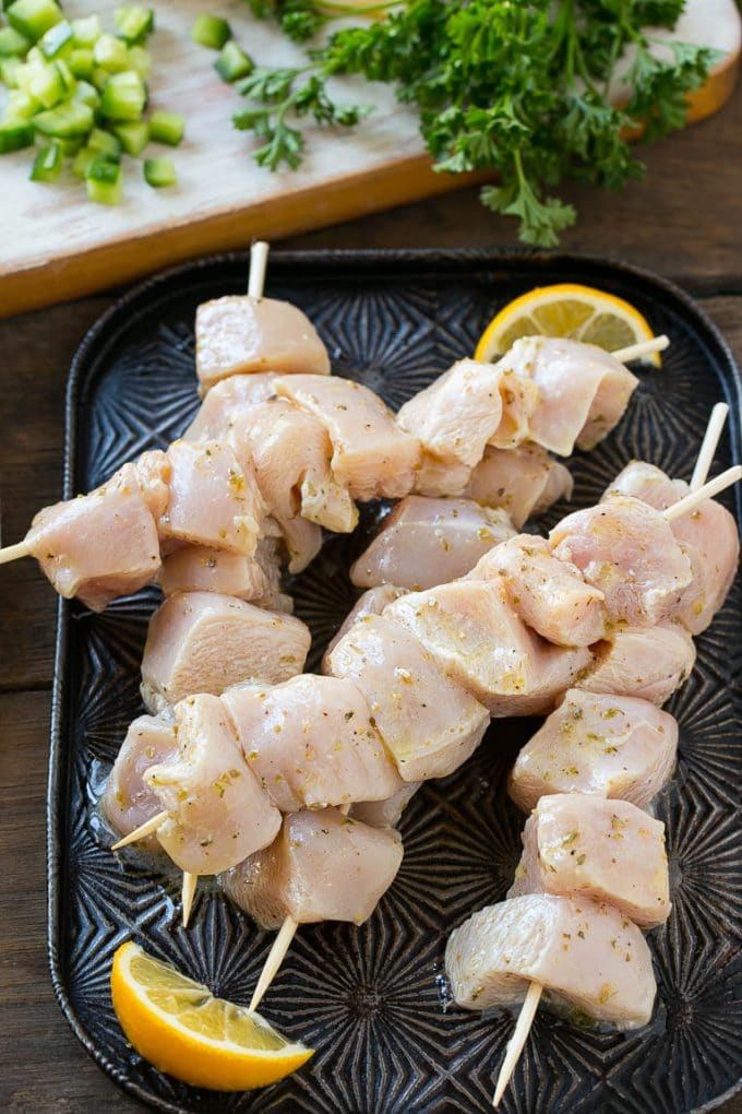 Greek Chicken Souvlaki Recipe | Easy Greek Chicken | Chicken Souvlaki | Greek Chicken Skewers | Easy Greek Chicken Skewers #chicken #kabobs #glutenfree #keto #lowcarb #grilling #fuyos Chunks of marinated chicken breast threaded onto skewers to be grilled.