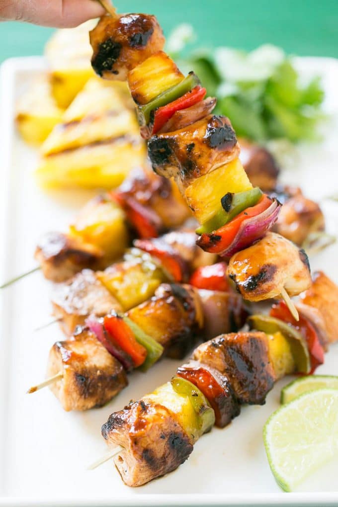 Hawaiian chicken skewered with pineapple and bell peppers.