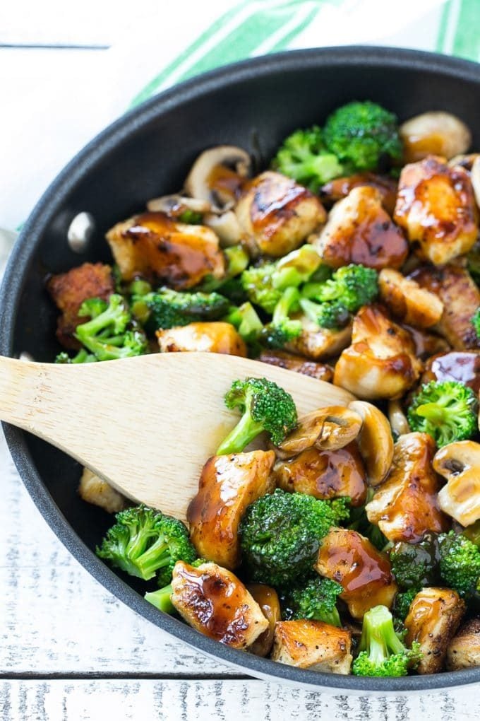 Chicken and Broccoli Stir Fry Recipe | Chicken Stir Fry | Healthy Chicken Recipe | Chicken and Broccoli | Chinese Food #chicken #broccoli #stirfry #healthy #cleaneating #dinner #fuyos A stir fry of chicken, broccoli and mushrooms in a skillet with a spatula.