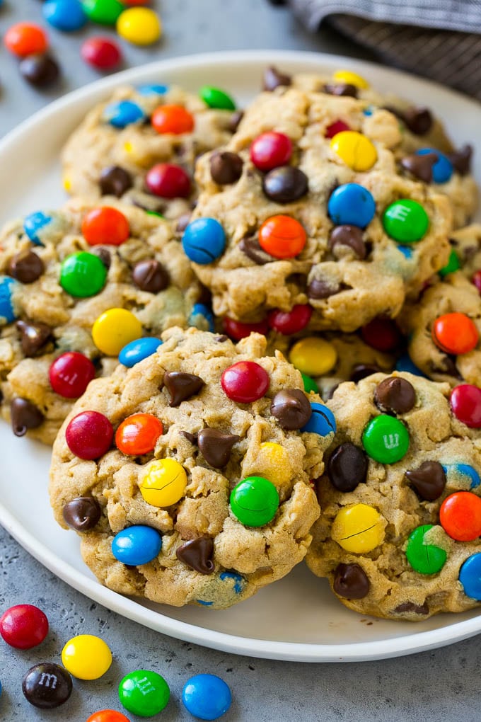 Monster Cookies Recipe | Oatmeal Cookies | Peanut Butter Cookies | M&M's Cookies #baking #cookies #dessert #peanutbutter #chocolate #fuyos A plate of monster cookies which are made with oats, peanut butter, chocolate chips and M&M's.