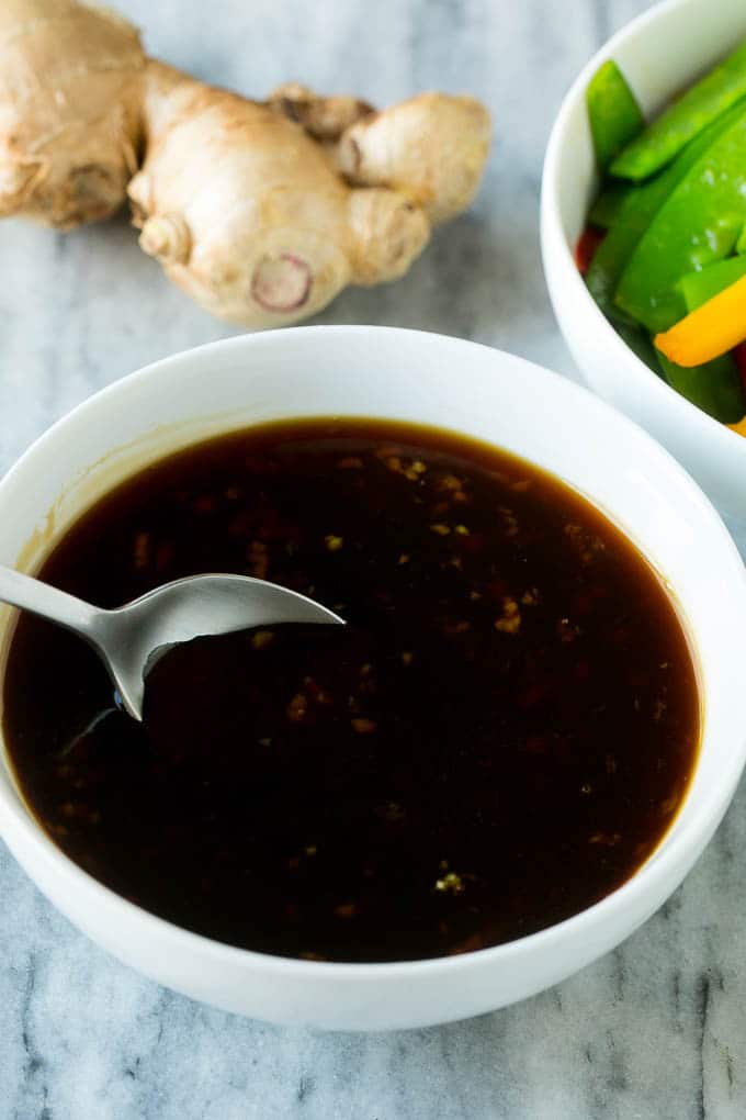 Teriyaki Shrimp Stir Fry Recipe | Shrimp Stir Fry | Healthy Stir Fry #shrimp #teriyaki #vegetables #stirfry #dinner #fuyos A bowl of homemade teriyaki sauce with a spoon in it.