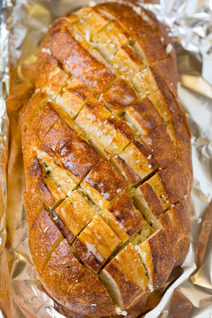 Pull Apart Bread | Garlic Bread | Cheese Bread #bread #garlic #cheese #sidedish #appetizer #fuyos Garlic butter and shredded cheese stuffed into a cut loaf of bread.