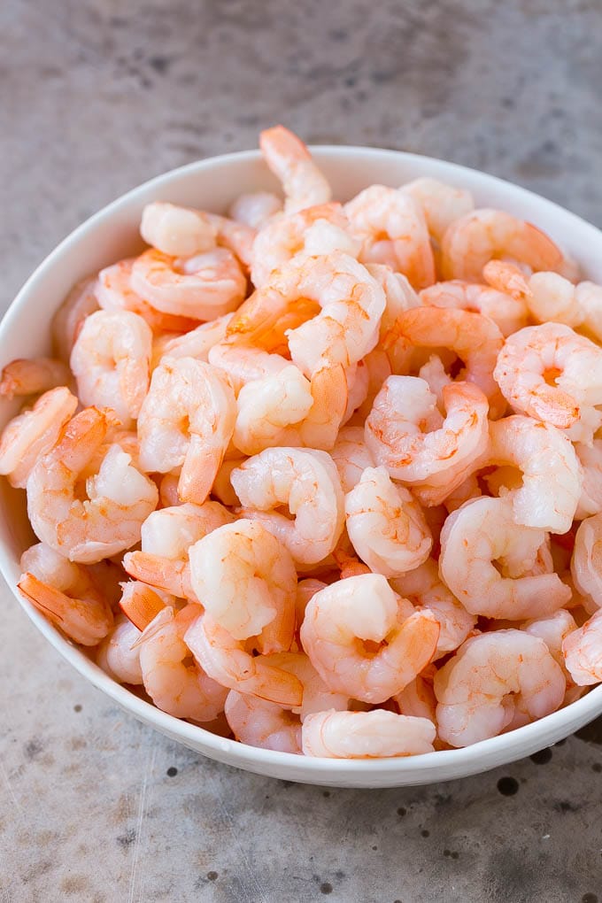 Shrimp Ceviche Recipe | Mexican Shrimp | Marinated Shrimp #shrimp #ceviche #cleaneating #healthy #lowcarb #keto #glutenfree #dinner #appetizer #fuyos Cooked prawns in a serving bowl.