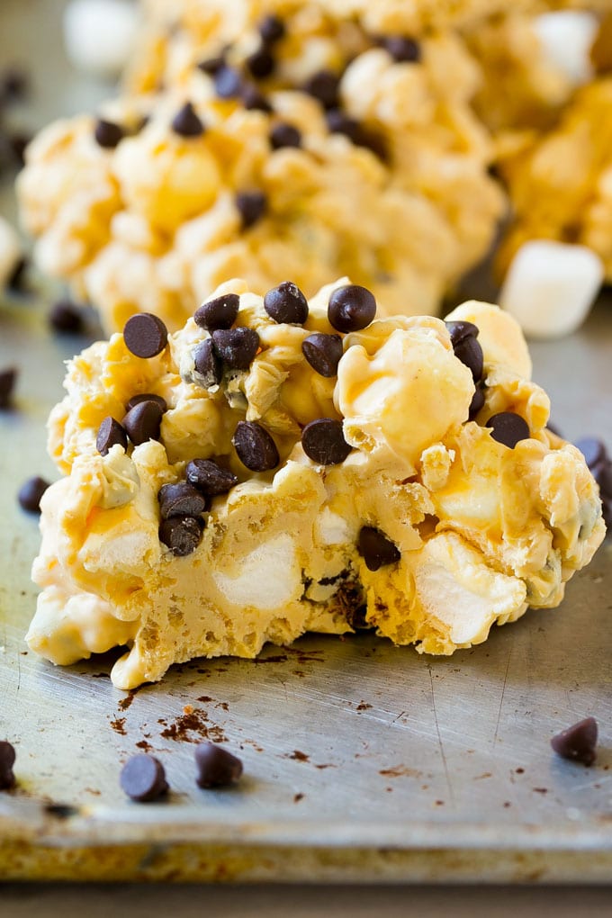 Avalanche Cookies Recipe | No Bake Cookie Recipe | Easy Cookie Recipe | Avalanche Bark #bark #avalanche #avalanchecookies #cookies #nobakecookies #nobake #dessert #fuyos A close up of an avalanche cookie with a bite taken out of it.