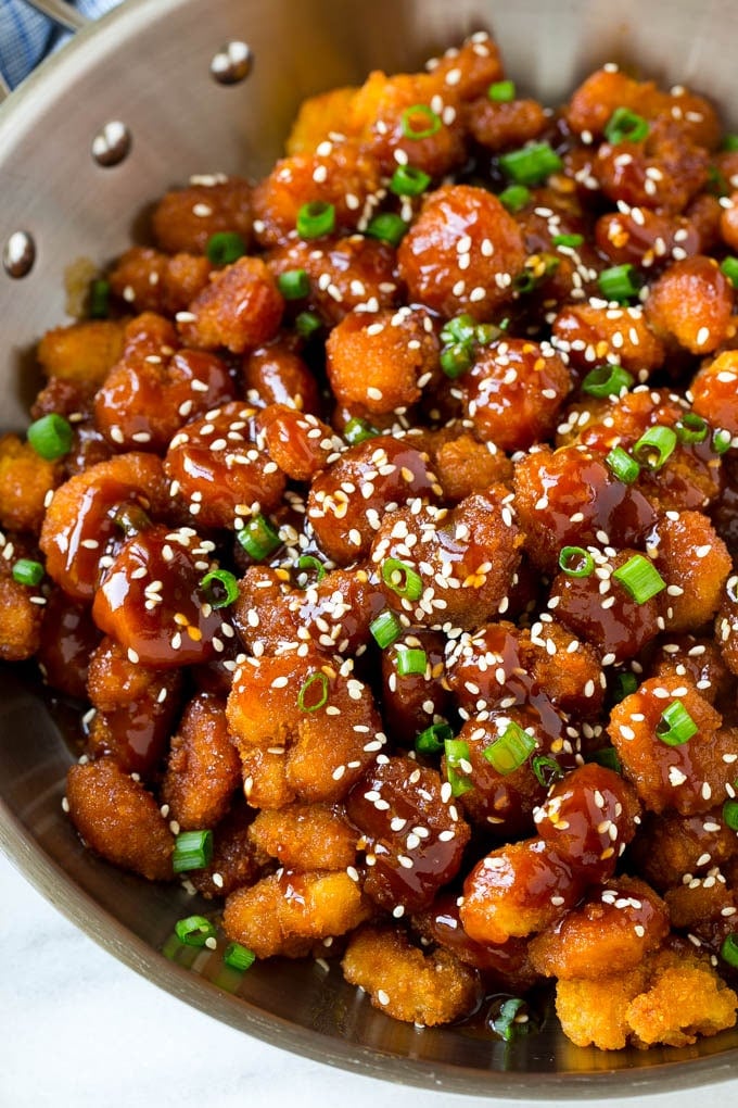 Sesame Shrimp Recipe | Crispy Shrimp | Popcorn Shrimp | Asian Shrimp | Easy Shrimp Recipe #shrimp #fried #friedshrimp #sesameshrimp #crispy #popcornshrimp #chinese #asian #dinner #fuyos A pan of popcorn shrimp in an Asian sesame sauce.