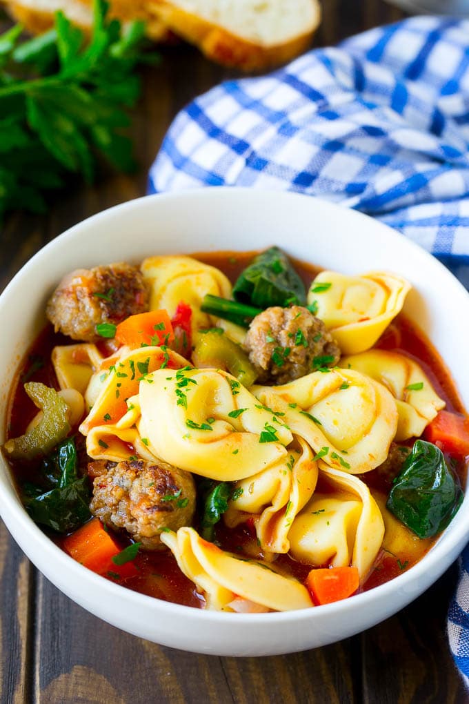 Tortellini Soup Recipe | Sausage Soup | Italian Soup #soup #sausage #pasta #tortellini #dinner #fuyos A bowl of tortellini soup with sausage and vegetables.