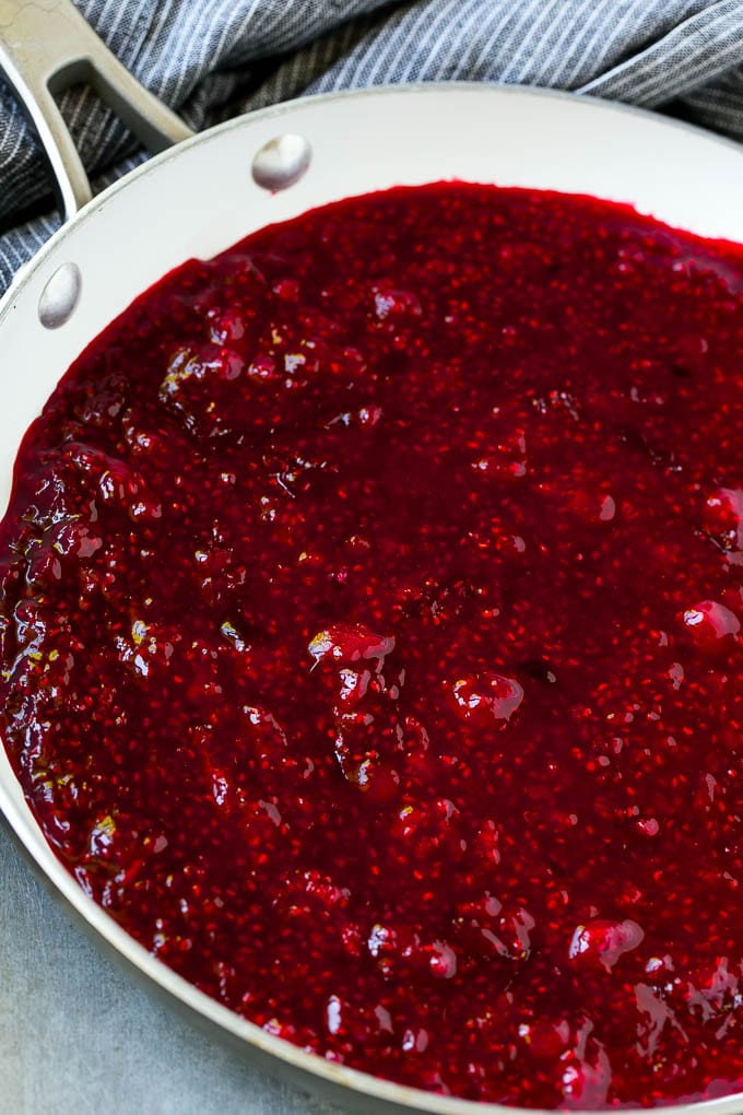Raspberry Sauce Recipe | Homemade Raspberry Sauce | Raspberry Recipe #raspberries #dessert #fuyos Berries cooked in a skillet.