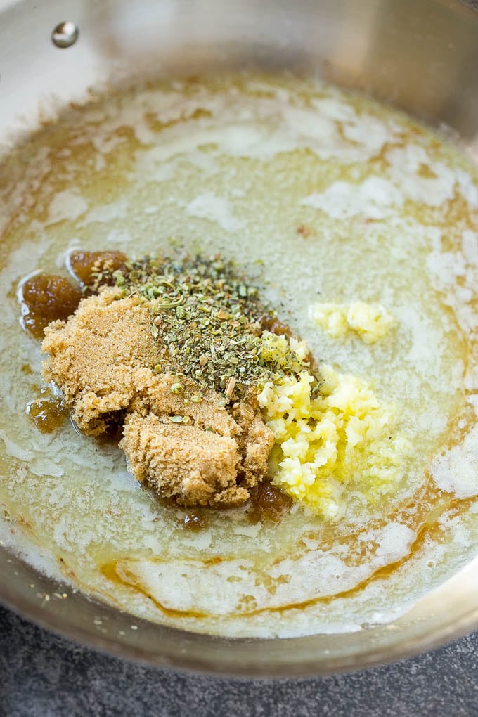Brown Sugar Pork Chops Recipe | Bone In Pork Chops Recipe | Garlic Butter Pork Chops | Skillet Pork Chops #pork #porkchops #garlic #dinner #glutenfree #fuyos Melted butter, brown sugar, herbs and garlic form the sauce for pork chops.