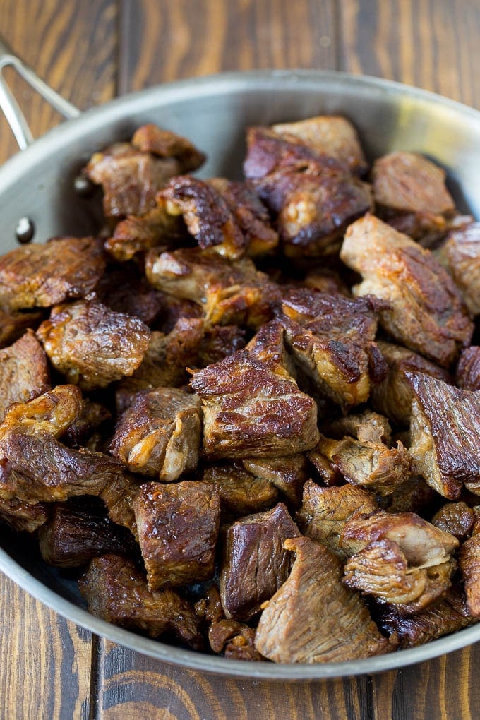 Slow Cooker Beef Stew Recipe | Crockpot Beef Stew #stew #soup #beef #slowcooker #crockpot #dinner #fuyos Browned beef in a skillet.