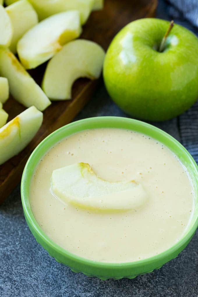 Apple Fries Recipe | Fried Apples Recipe | Cinnamon Sugar Apples | Apple Dessert Recipe #apples #dessert #fuyos #fall An apple slice coated in batter.