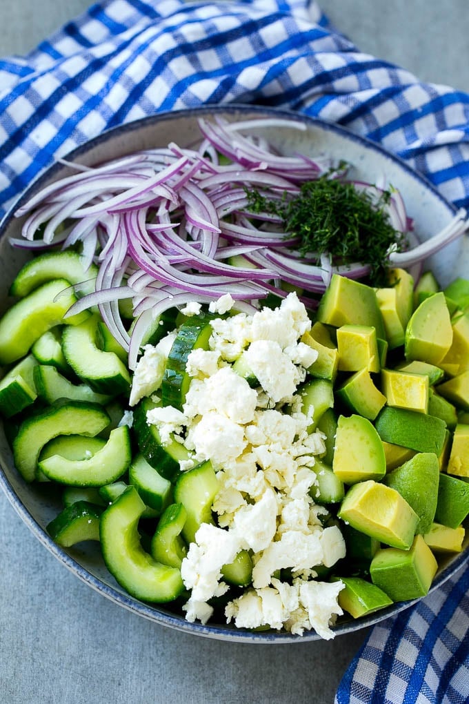 Cucumber Feta Salad Recipe | Cucumber Salad | Feta Cheese Salad | Summer Salad #salad #cucumber #fuyos Salad ingredients in a bowl.