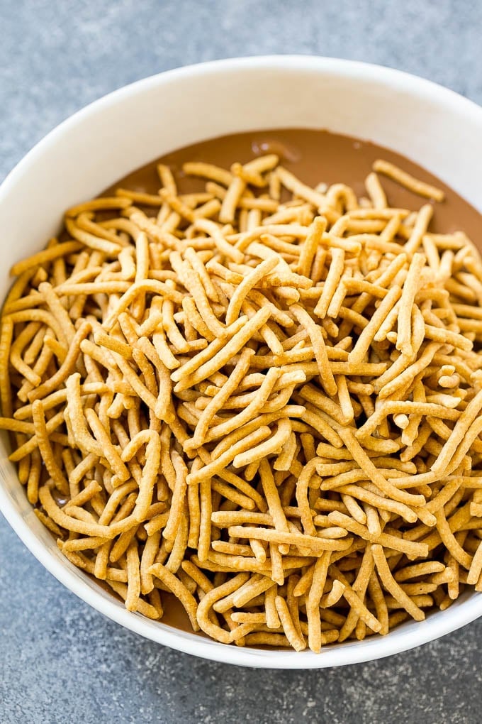Haystack Cookies Recipe | No Bake Cookies | Chow Mein Noodle Cookies #nobakecookies #cookies #recipe #chocolate #fuyos A bowl of melted chocolate and chow mein noodles.