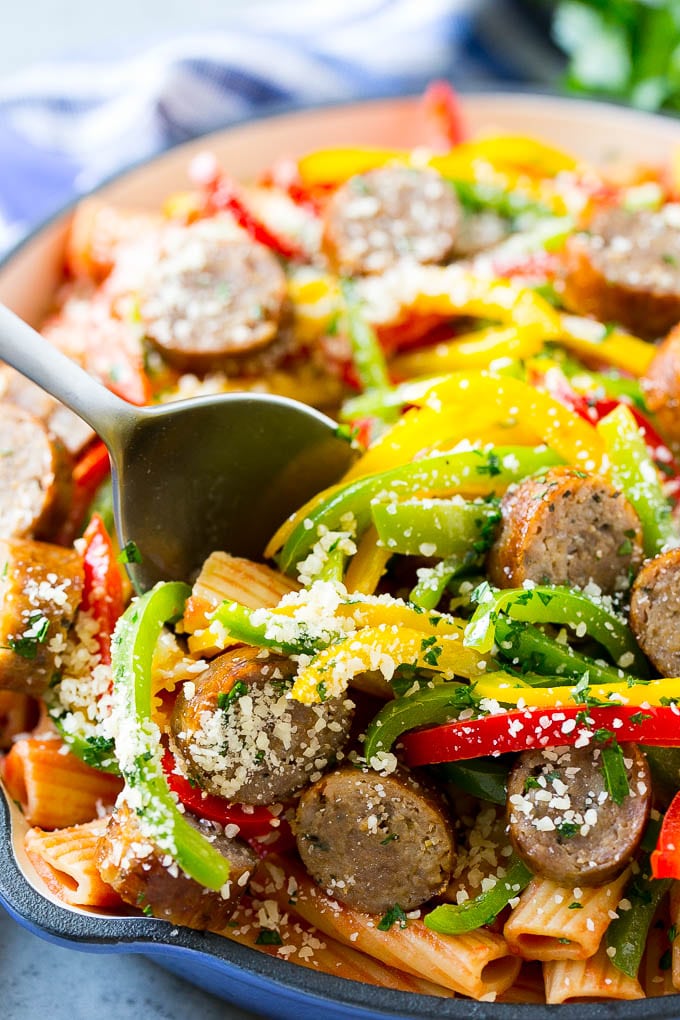 Sausage and Pepper Pasta Recipe | Italian Sausage Recipe | Sausage and Peppers | Easy Pasta #pasta #sausage #peppers #dinner #fuyos Sausage and pepper pasta with Italian sausage, topped with parmesan cheese.