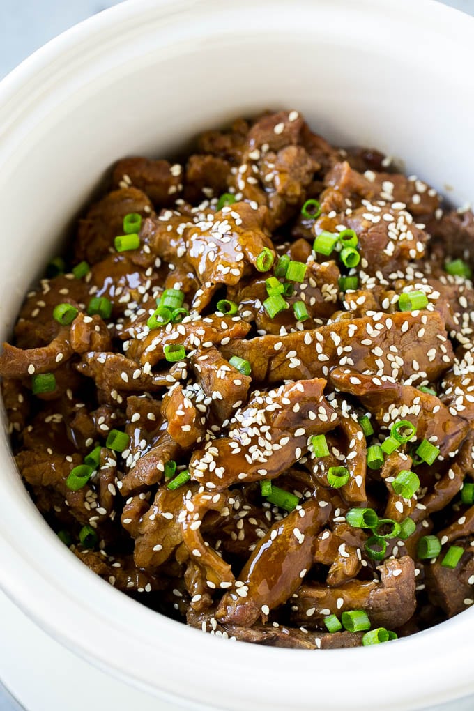 Slow Cooker Korean Beef Recipe | Korean Beef | Flank Steak Recipe #dinner #beef #slowcooker #crockpot #asian #fuyos Slow cooker Korean beef with flank steak slices in a sweet and savory sauce, all inside a crock pot.