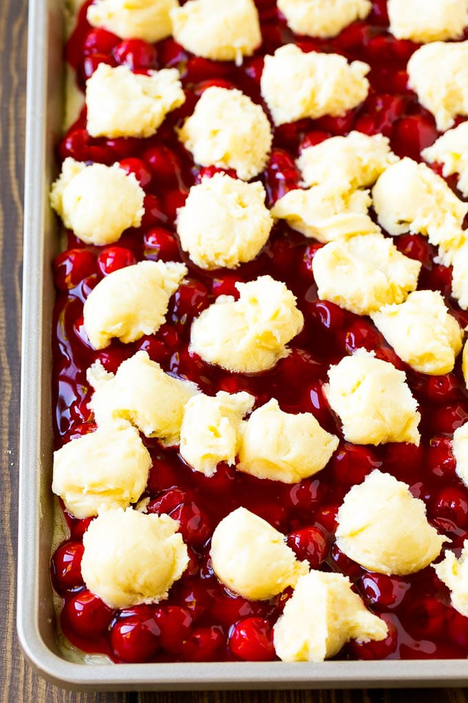 Cherry Bars Recipe | Cherry Pie Bars | Cherry Cookies | Bar Cookies #cookies #bars #cherry #baking #dessert #sweets #fuyos Filling with dollops of cookie dough on top.