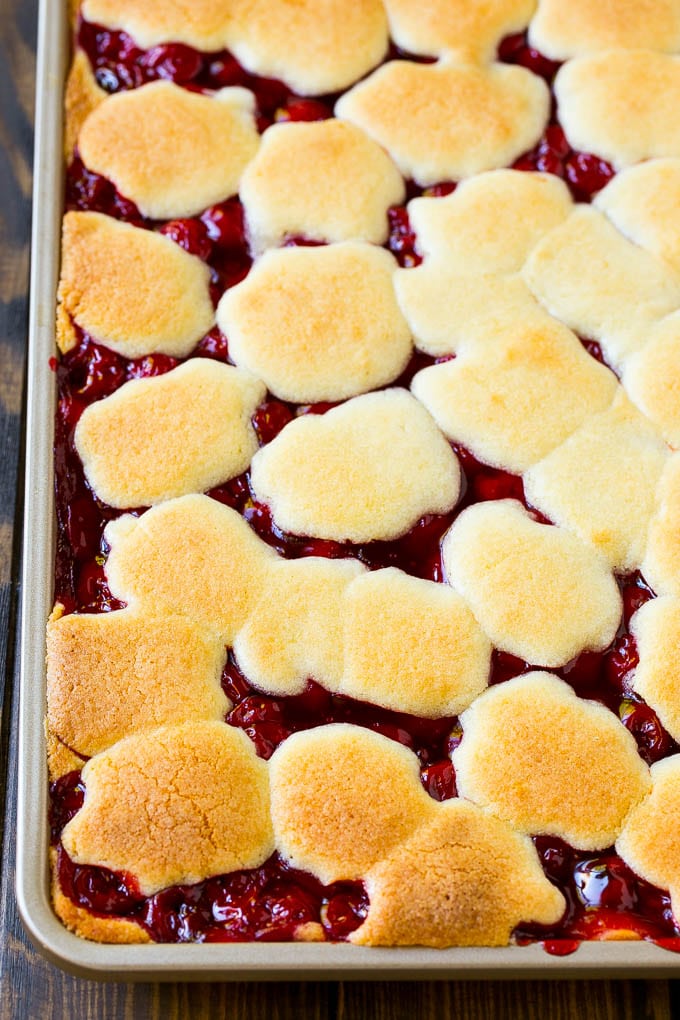Cherry Bars Recipe | Cherry Pie Bars | Cherry Cookies | Bar Cookies #cookies #bars #cherry #baking #dessert #sweets #fuyos A pan of baked dough and filling.