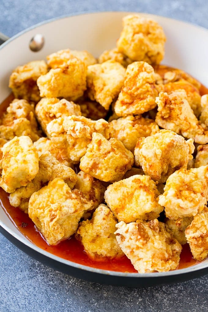 Sweet Chili Chicken Recipe | Thai Chicken | Asian Chicken #chicken #thaifood #chili #dinner #fuyos Crispy chicken breast pieces with sweet chili sauce in a pan.