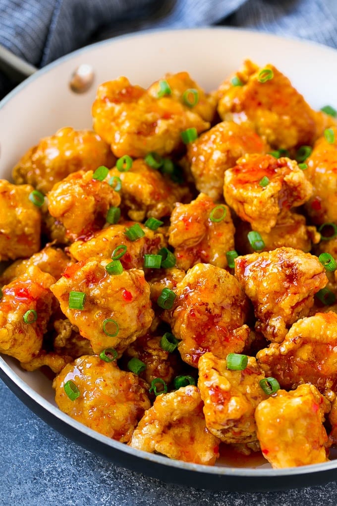 Sweet Chili Chicken Recipe | Thai Chicken | Asian Chicken #chicken #thaifood #chili #dinner #fuyos Sweet chili chicken in a skillet, topped with sliced green onions.