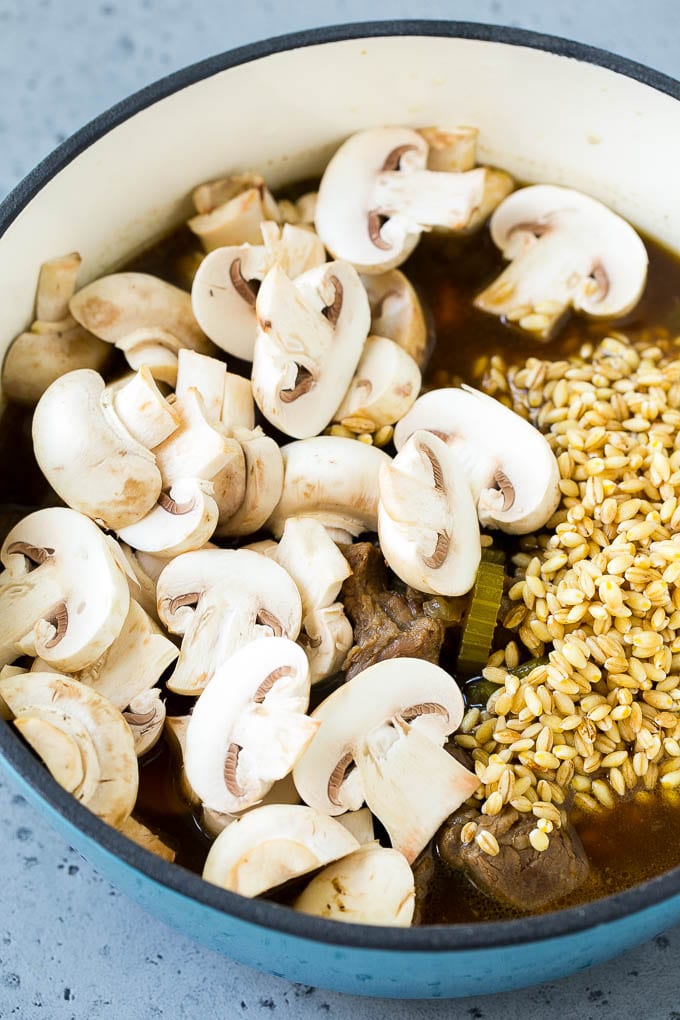 Beef Barley Soup Recipe | Beef Soup | Barley Soup #soup #beef #dinner #vegetables #fuyos #comfortfood Beef barley soup with sliced mushrooms and barley stirred in.