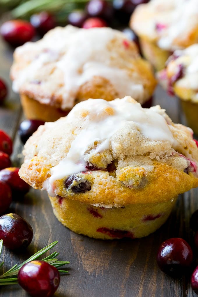 Cranberry Muffins Recipe | Cranberry Orange Muffins #cranberry #muffins #orange #fall #dessert #fuyos Cranberry muffins topped with streusel and orange glaze.