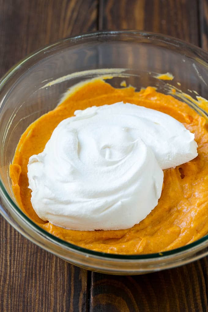 Cool whip in a bowl with the creamy base.