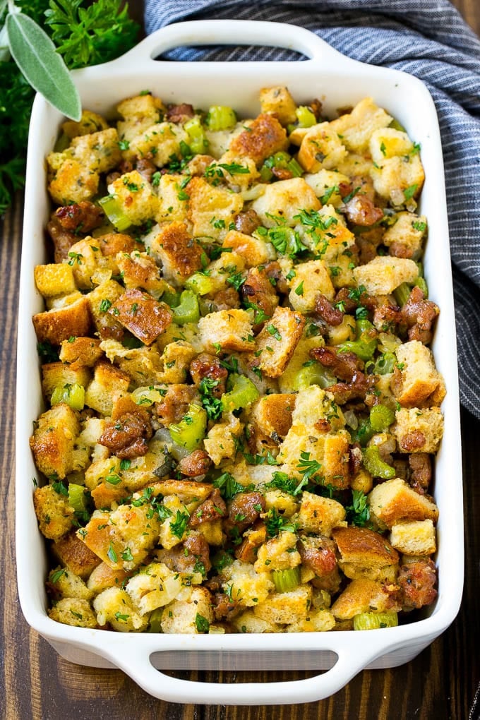 Sausage Stuffing Recipe | Thanksgiving Stuffing | Make Ahead Stuffing #stuffing #thanksgiving #sausage #sidedish #dinner #fuyos A baking dish of sausage stuffing made with Italian sausage, bread cubes and vegetables.