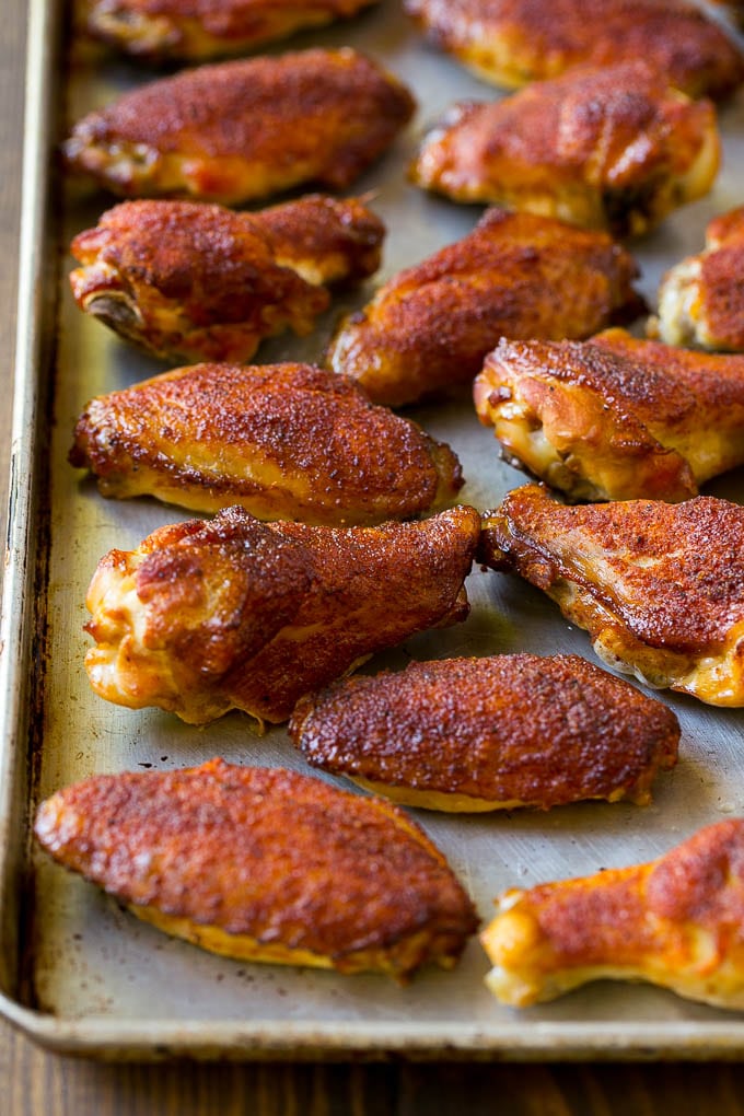 Smoked Chicken Wings | Barbecue Chicken Wings | BBQ Chicken Wings #chicken #wings #bbq #barbecue #appetizer #dinner #fuyos Smoked chicken wings coated in spice rub on a sheet pan.