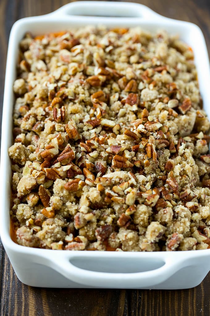 Sweet Potato Casserole with Pecans Recipe | Sweet Potato Casserole | Sweet Potato Side Dish #sweetpotatoes #thanksgiving #pecans #casserole #sidedish #holiday #fall #fuyos An uncooked sweet potato casserole with pecan streusel.