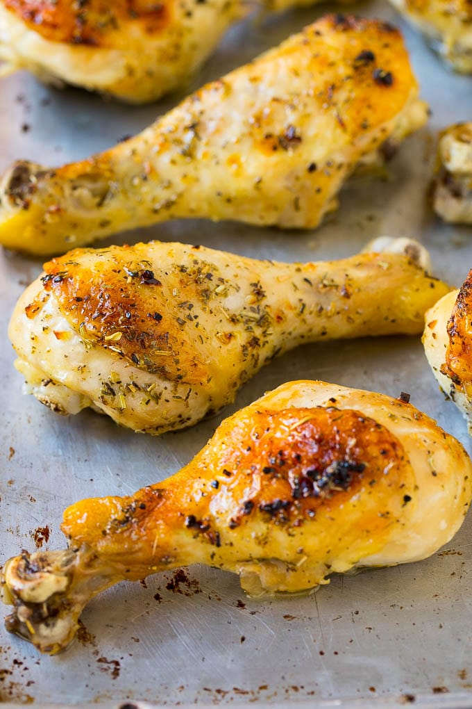 Baked Chicken Drumsticks Recipe | Roasted Chicken Drumsticks | Garlic and Herb Chicken #dinner #chicken #garlic #glutenfree #lowcarb #keto #cleaneating #fuyos Baked chicken drumsticks on a sheet pan.
