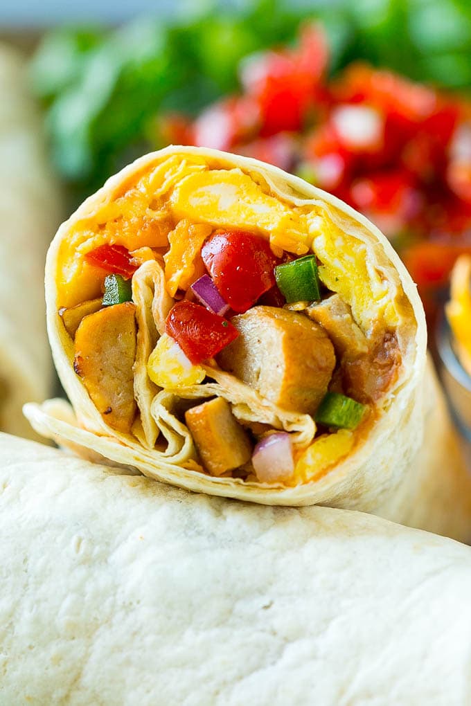 Breakfast Burrito Recipe | Sausage Breakfast Burrito #breakfast #sausage #eggs #burrito #fuyos A breakfast burrito stuffed with sausage, eggs, pico de gallo and cheese.