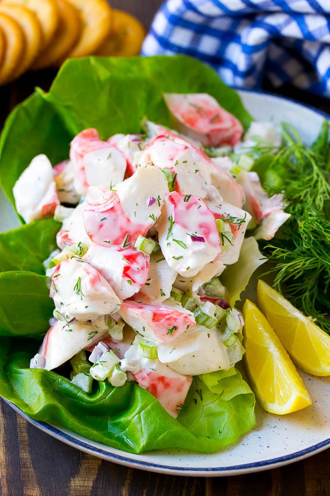 Crab Salad Recipe | Seafood Salad | Deli Salad #crab #salad #seafood #lowcarb #keto #lunch #dinner #fuyos Crab salad served on a bed of lettuce with a side of crackers.