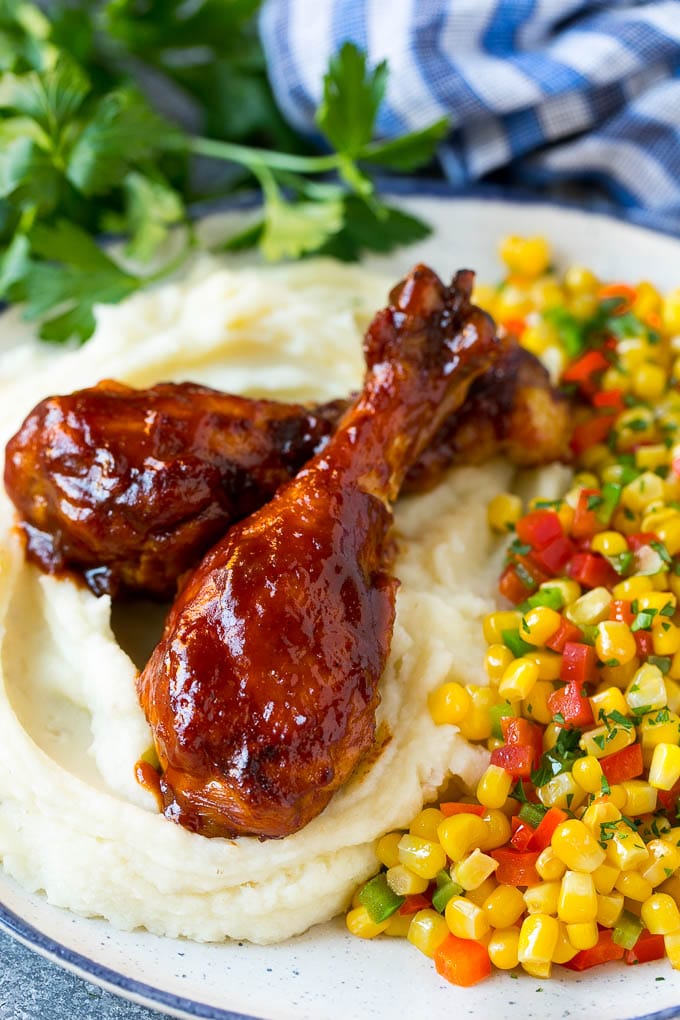 Slow Cooker Chicken Drumsticks Recipe | Crock Pot Chicken Drumsticks | BBQ Chicken Drumsticks #chicken #drumsticks #slowcooker #crockpot #bbq #dinner #fuyos Slow cooker chicken drumsticks served with mashed potatoes and corn.