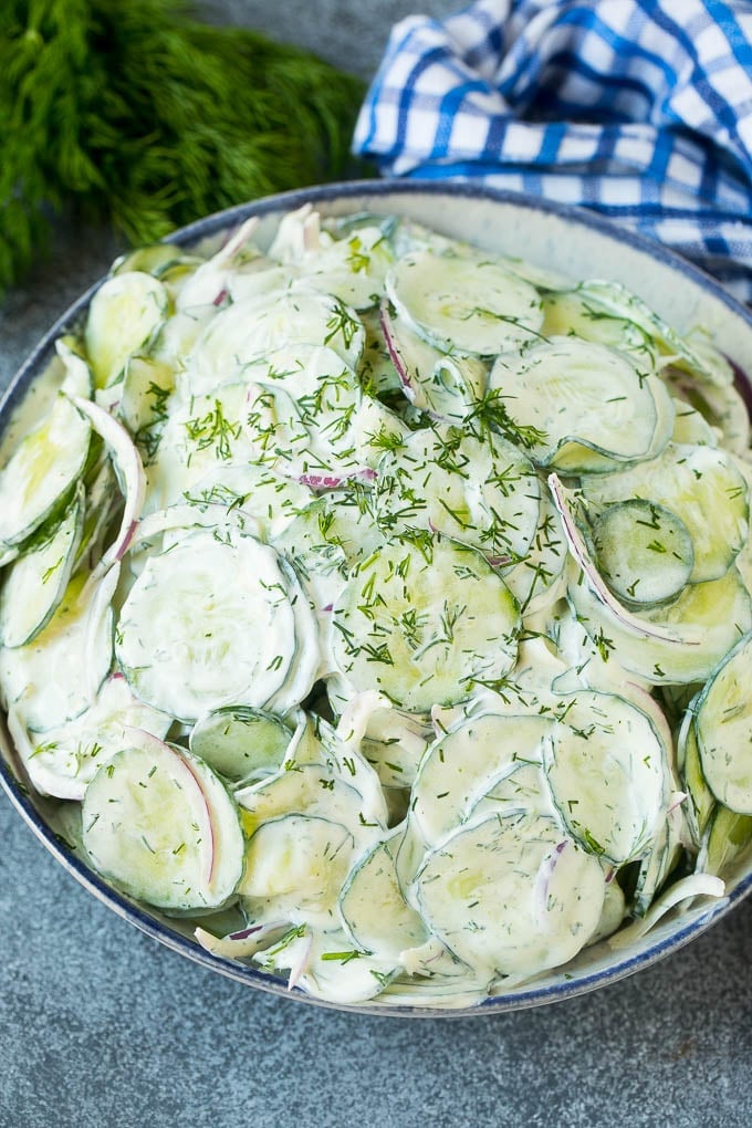 Creamy Cucumber Salad Recipe | German Cucumber Salad | Cucumber Salad #cucumber #salad #dinner #lunch #fuyos #cucumbersalad Creamy cucumber salad with red onion and dill, topped with fresh herbs for garnish.