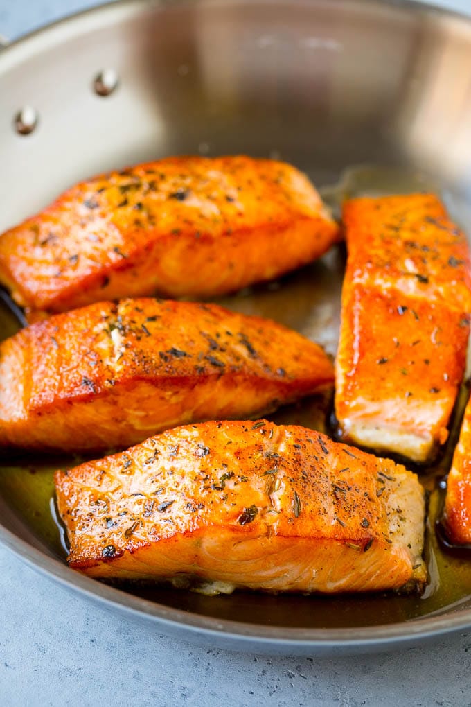 Greek Salmon Salad Recipe | Low Carb Salmon Recipe | Salmon Salad #salmon #seafood #fish #lowcarb #keto #lunch #fuyos #healthy Seared fish fillets in a skillet.