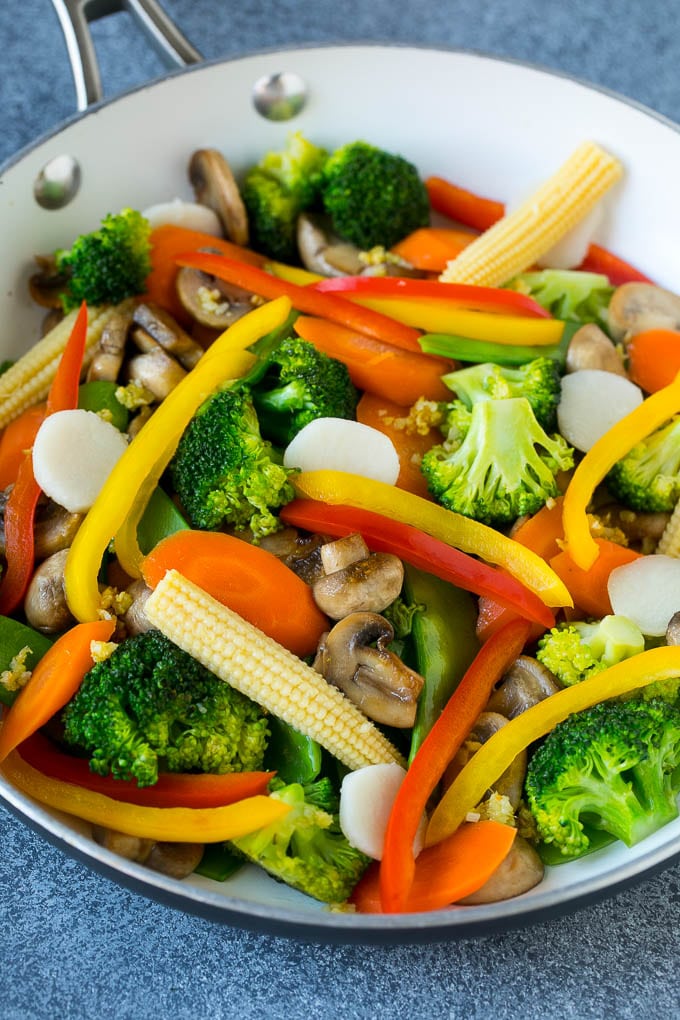 Vegetable Stir Fry Recipe | Veggie Stir Fry | Broccoli Stir Fry #vegetarian #vegetables #broccoli #dinner #fuyos A pan of sauteed baby corn, water chestnuts, peppers, broccoli and mushrooms.