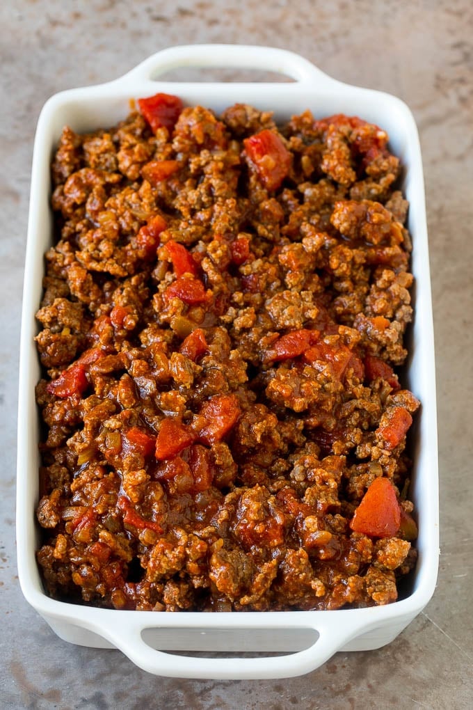 Cooked taco meat in a casserole dish.