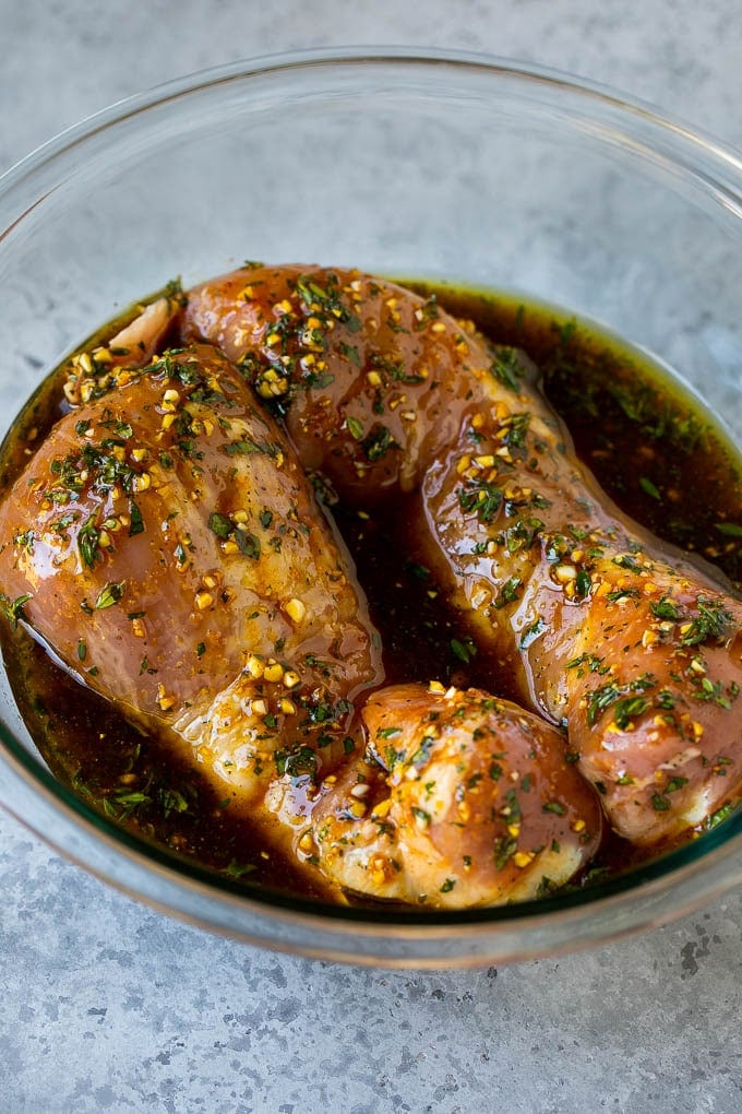 Marinated Pork Tenderloin Recipe | Pork Tenderloin Marinade | Pork Marinade #pork #porktenderloin #marinade #dinner #grilling #fuyos Pork tenderloins in a bowl of marinade.