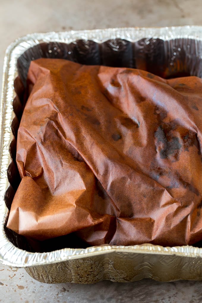 Brisket wrapped in butcher paper.