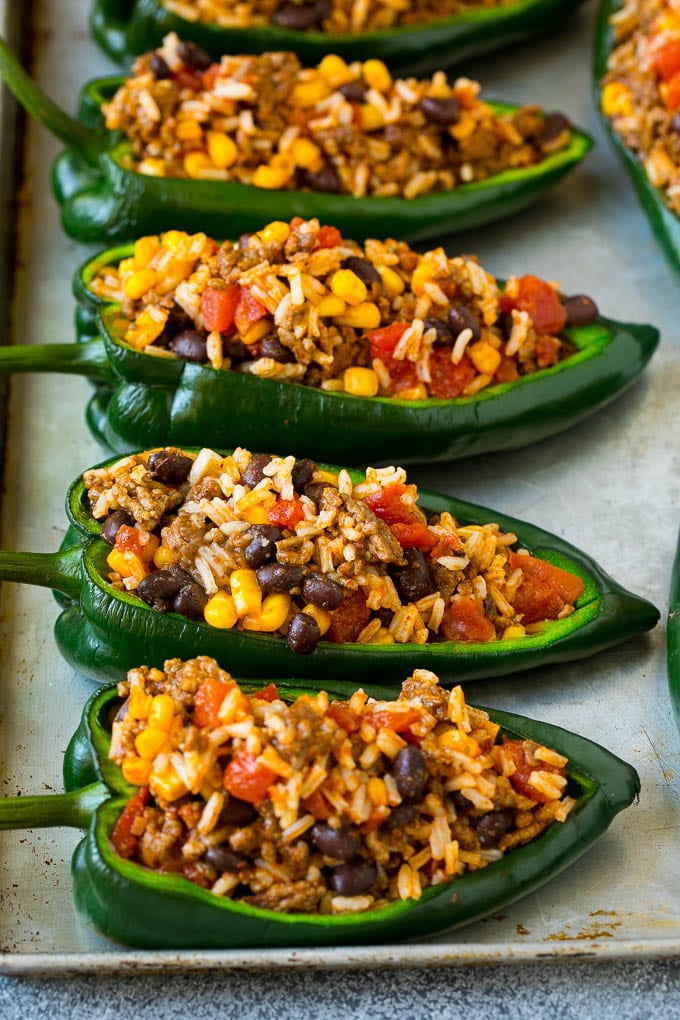 Stuffed Poblano Peppers | Stuffed Peppers | Pasilla Peppers #peppers #stuffedpeppers #beef #rice #beans #corn #dinner #fuyos Poblano peppers filled with rice, meat, beans and corn.
