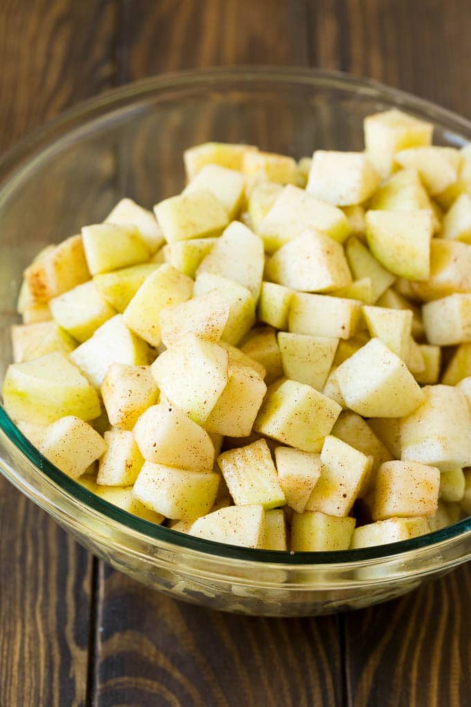 Apple Cobbler Recipe | Apple Dessert #apples #cobbler #dessert #baking #fall #fuyos Diced apples tossed with cinnamon and sugar.
