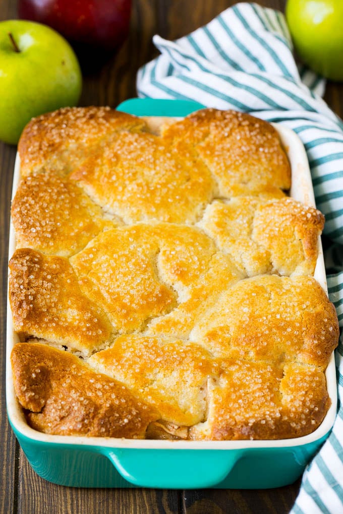 Apple Cobbler Recipe | Apple Dessert #apples #cobbler #dessert #baking #fall #fuyos A dish of baked apple dessert topped with sugar.