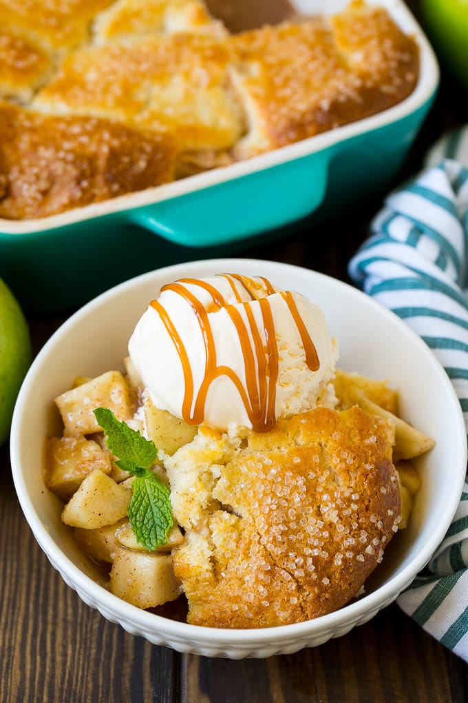 Apple Cobbler Recipe | Apple Dessert #apples #cobbler #dessert #baking #fall #fuyos Apple cobbler served with vanilla ice cream and caramel sauce.