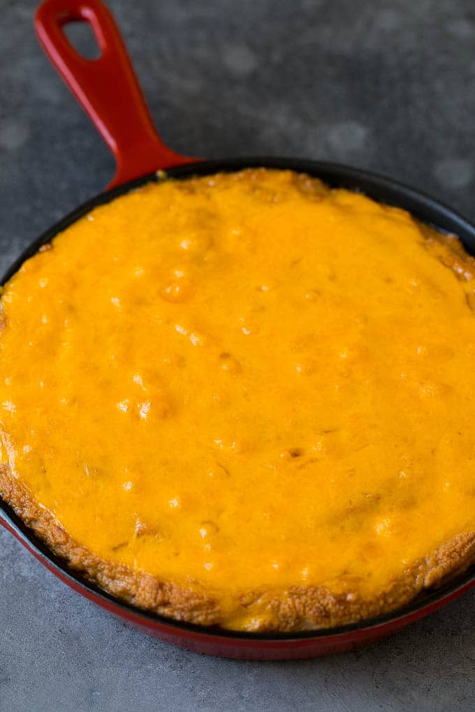 Bean Dip Recipe | Mexican Dip #dip #appetizer #mexicanfood #beans #cheese #fuyos Baked refried beans topped with melted cheddar cheese.