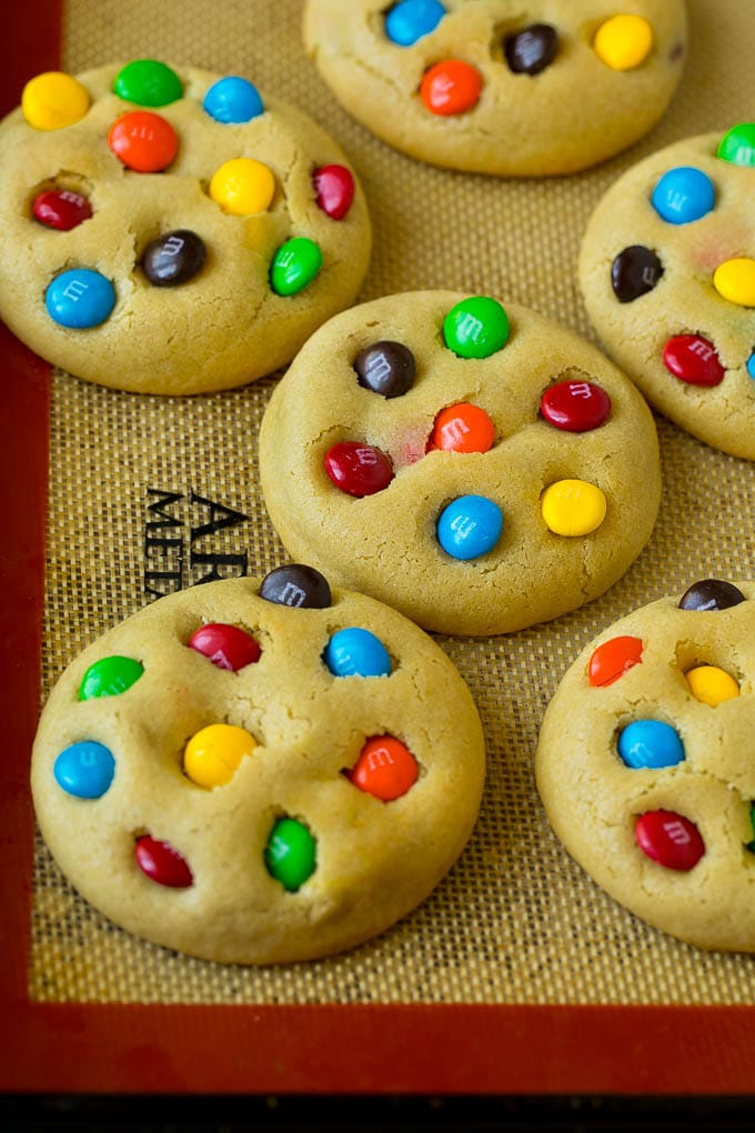 M&M Cookies Recipe #cookies #chocolate #baking #dessert #sweets #fuyos Baked cookies on a sheet pan.