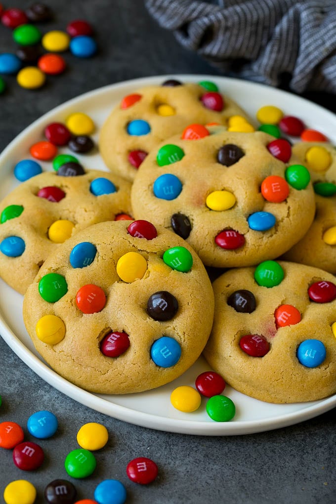 M&M Cookies Recipe #cookies #chocolate #baking #dessert #sweets #fuyos A plate of M&M cookies, garnished with extra candy.