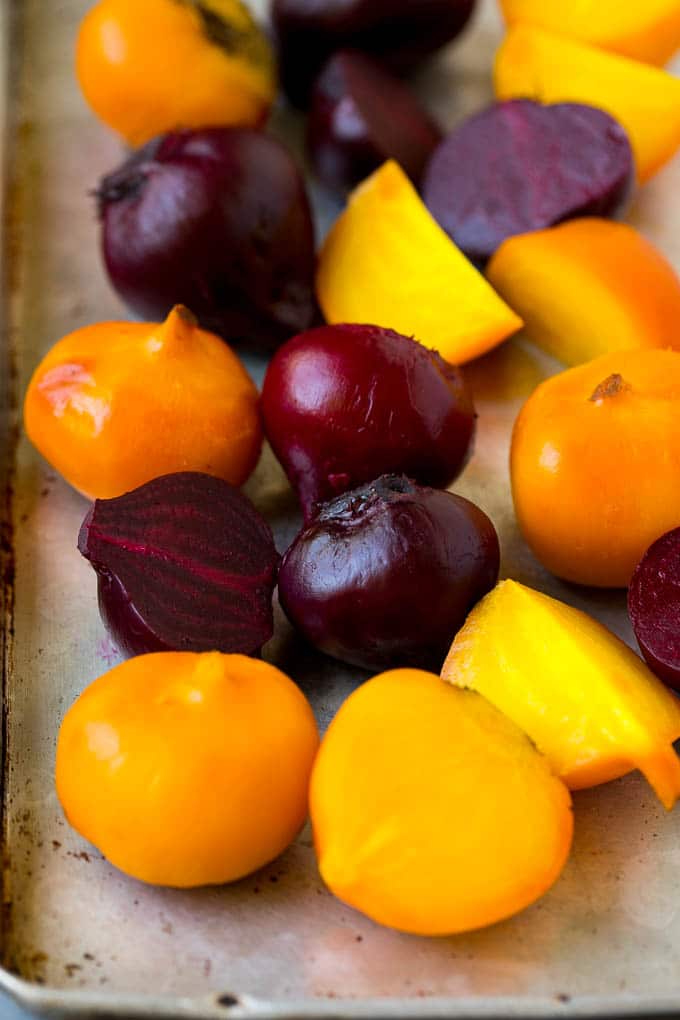 Beet Salad Recipe #beets #avocado #feta #salad #dinner #fuyos Roasted red and yellow beets on a sheet pan.
