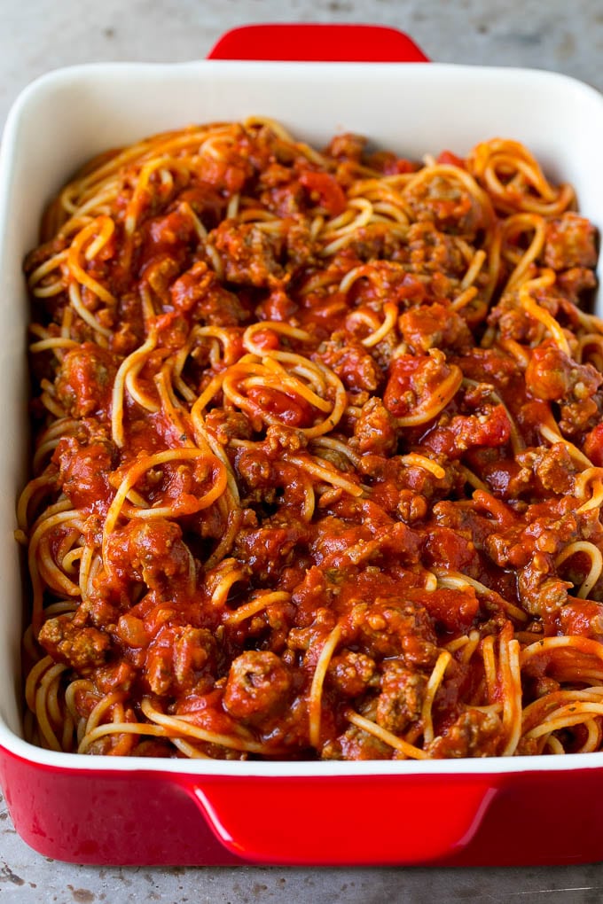 Baked Spaghetti Recipe | Baked Pasta #spaghetti #pasta #cheese #casserole #beef #sausage #dinner #fuyos Pasta tossed with meat sauce in a dish.