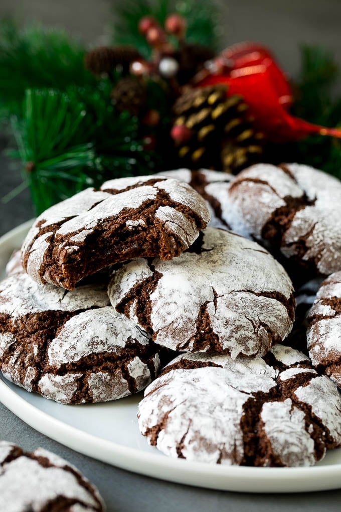 Chocolate Crinkle Cookies Recipe #cookies #chocolate #christmas #dessert #baking #fuyos A plate of chocolate crinkle cookies.