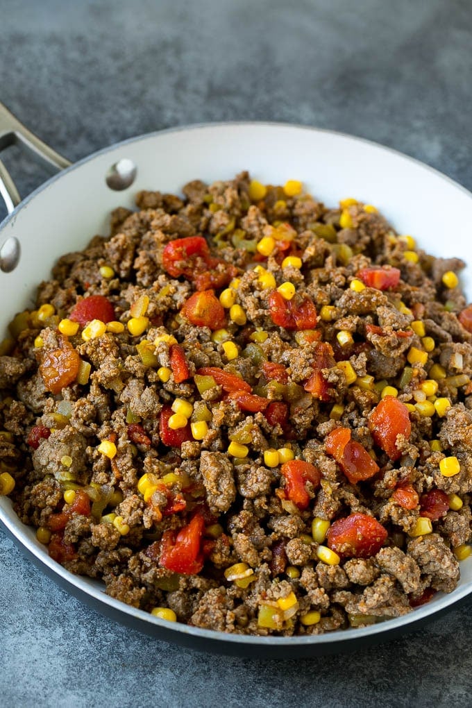 Mexican Lasagna Recipe | Mexican Casserole #mexican #lasagna #groundbeef #beans #dinner #cheese #fuyos Ground beef cooked with tomatoes, green chilies and corn.